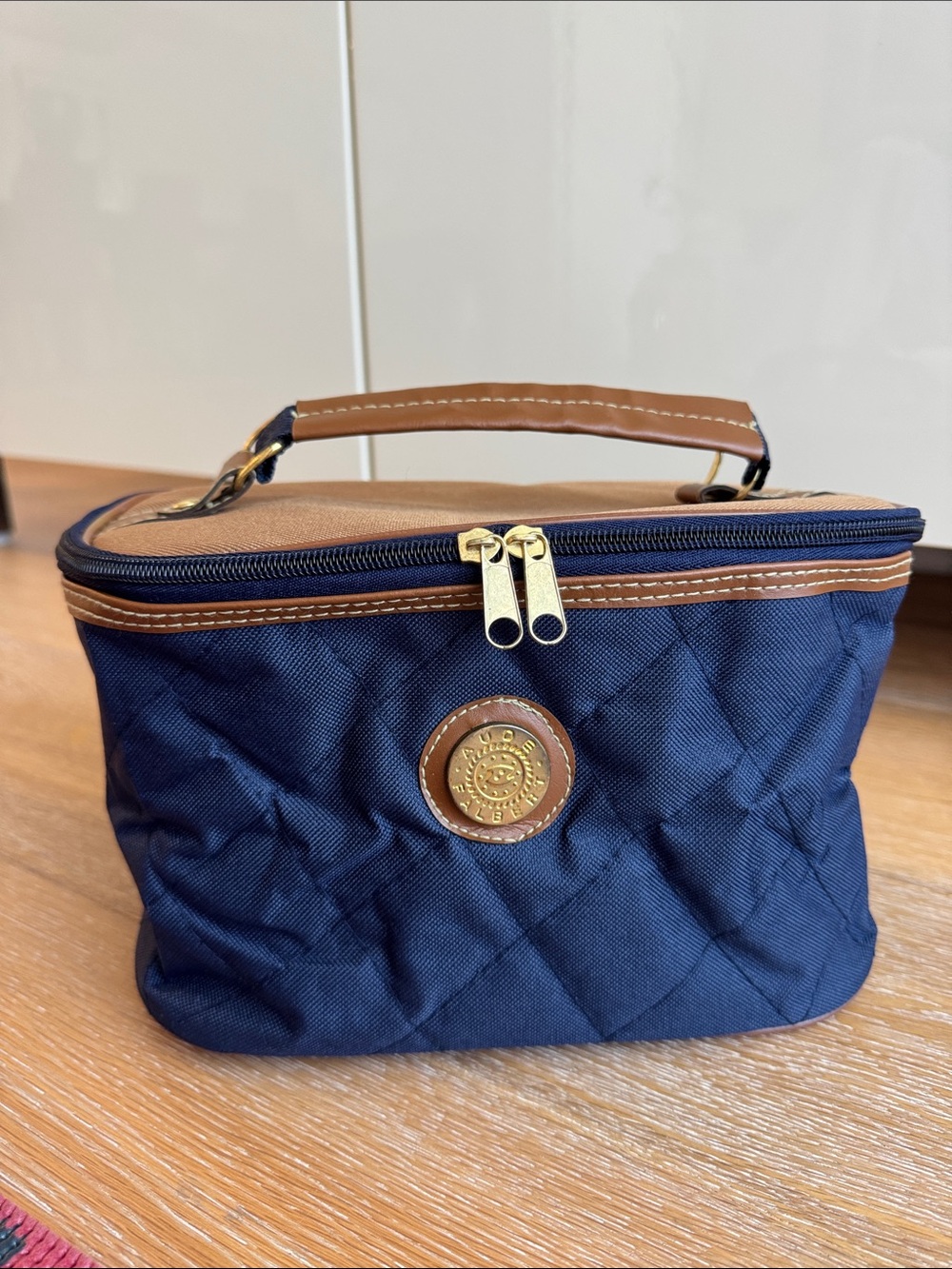 Aude Falbert Navy Quilted Cosmetic Case with Tan Trim and Gold Accents